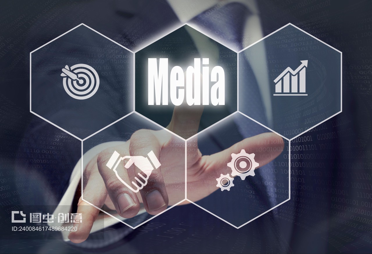 Businessman pressing a Media concept button.